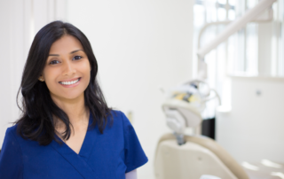 Smiling healthcare graduate from Hawaii Medical College, preparing for her first healthcare job in the medical field.