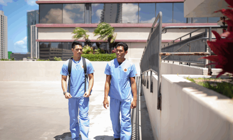 Local students in Hawai‘i receiving hands-on training, highlighting the importance of education that supports island communities.

